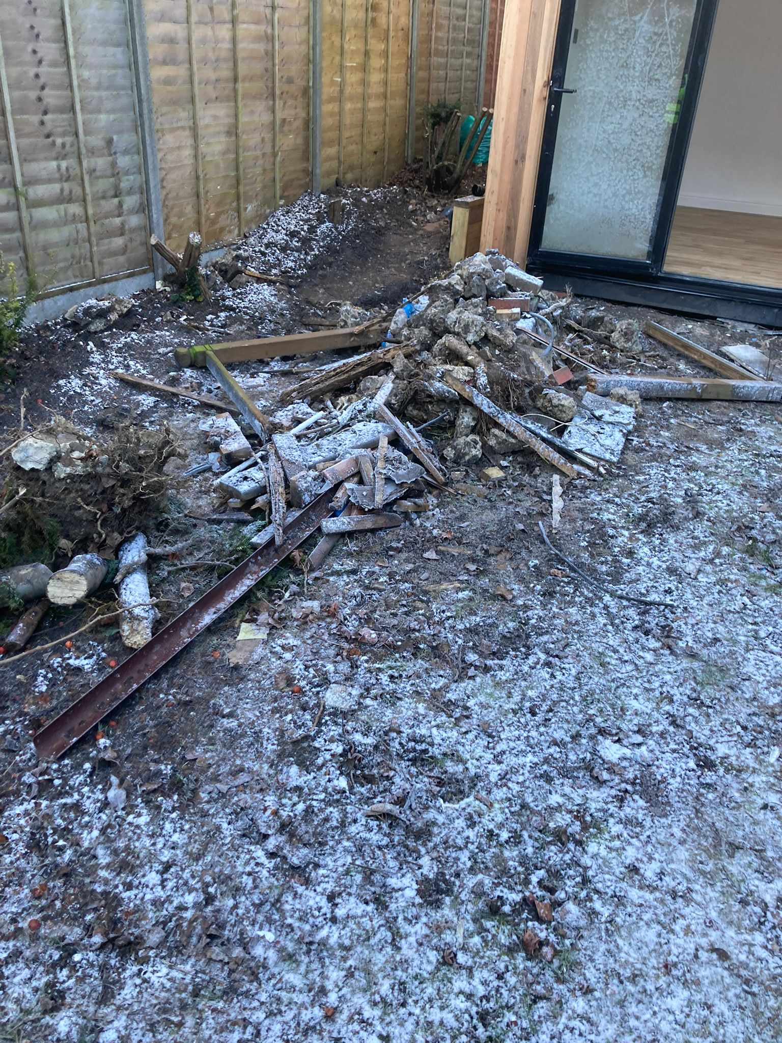 Before garden waste and rubble removal